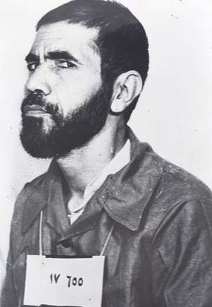 تصوير شهيد محمد مفتح در لباس زنداني